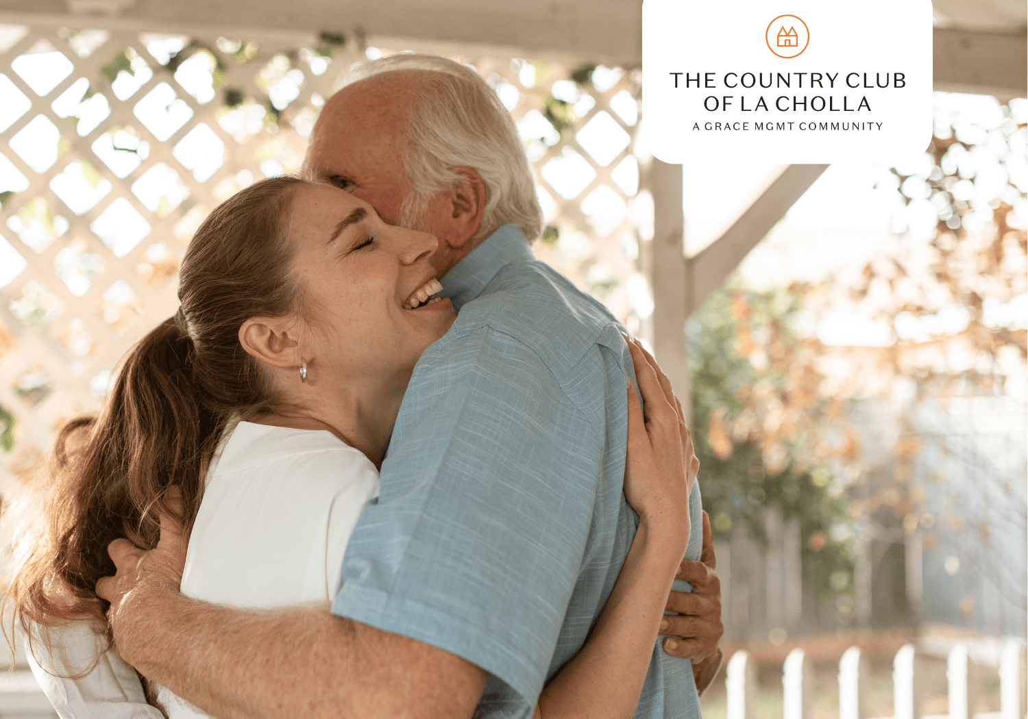 Elderly man hugging a young woman