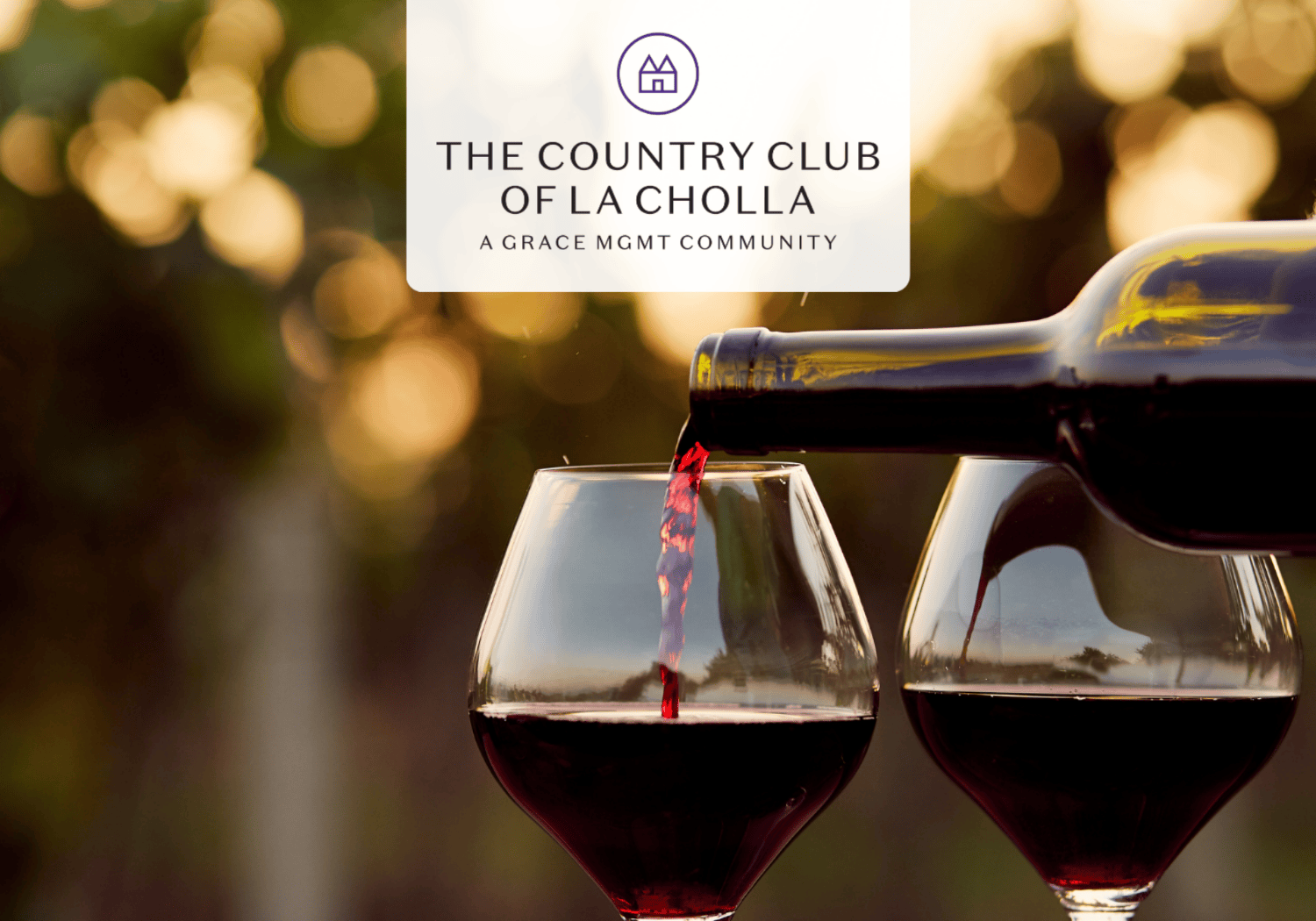 Wine being poured into two red wine glasses against a warm, blurred sunset background with the 'The Country Club of La Cholla' logo at the top.